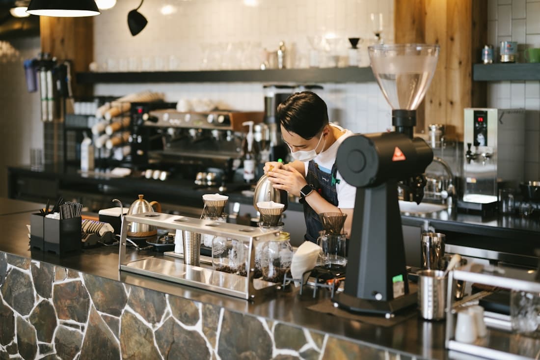 a person working in a kitchen